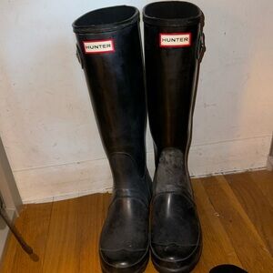 Black tall Hunter boots